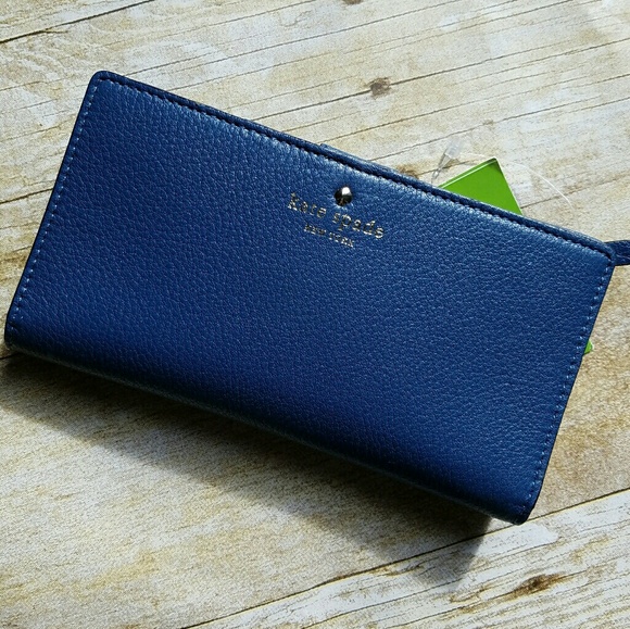 kate spade Handbags - kate spade navy blue leather zip wallet
